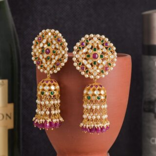 Gold earrings with pearls and gemstones