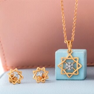 Gold jewelry set with pendant and earrings