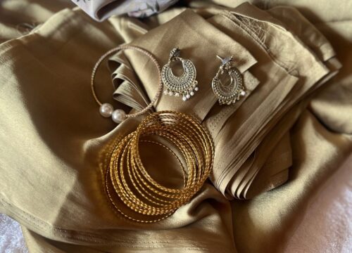 Silk fabric with gold and silver jewelry